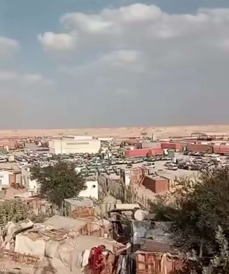 الكشف عن السبب الحقيقي لتكدس الشاحنات في منفذ شحن.. والجمارك تنفي رفع الرسوم